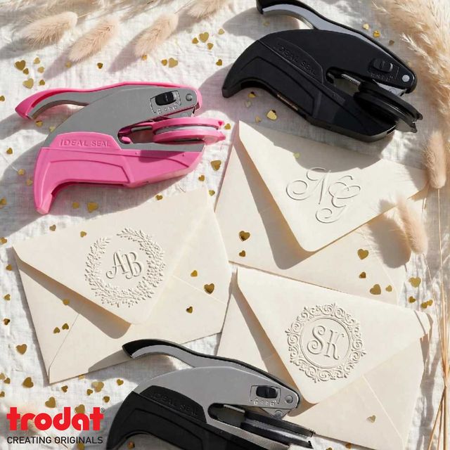 Embossed monograms on envelopes